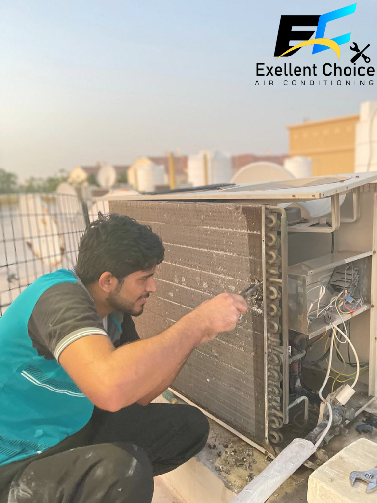 technician repairing condenser