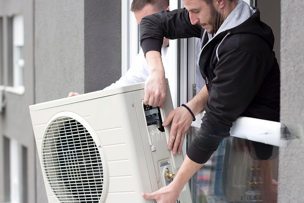 AC inspection team is checking the unit